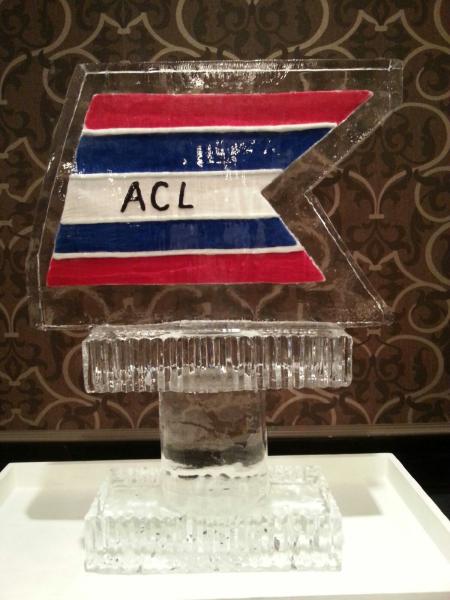 Beautiful Ice Sculpture custom made with three colors of sand of the ACL logo for an annual event. Price $295