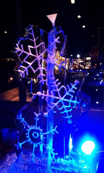 Louisville Ice Sculptures snowflake drink luge will keep your drinks cold. Price $295